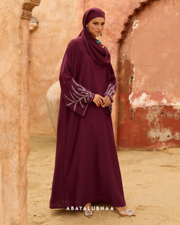 Nora Abaya in Maroon