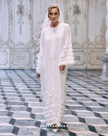 Valerie Abaya in Off White