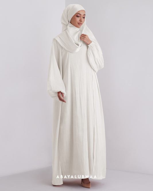 Elsa Abaya in Off White