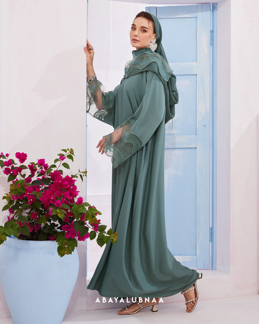 Catherine Abaya in Turquoise Tonic