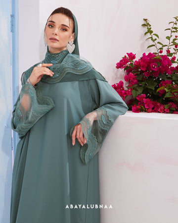 Catherine Abaya in Turquoise Tonic
