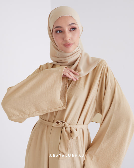 Imaan Abaya in Golden Nude