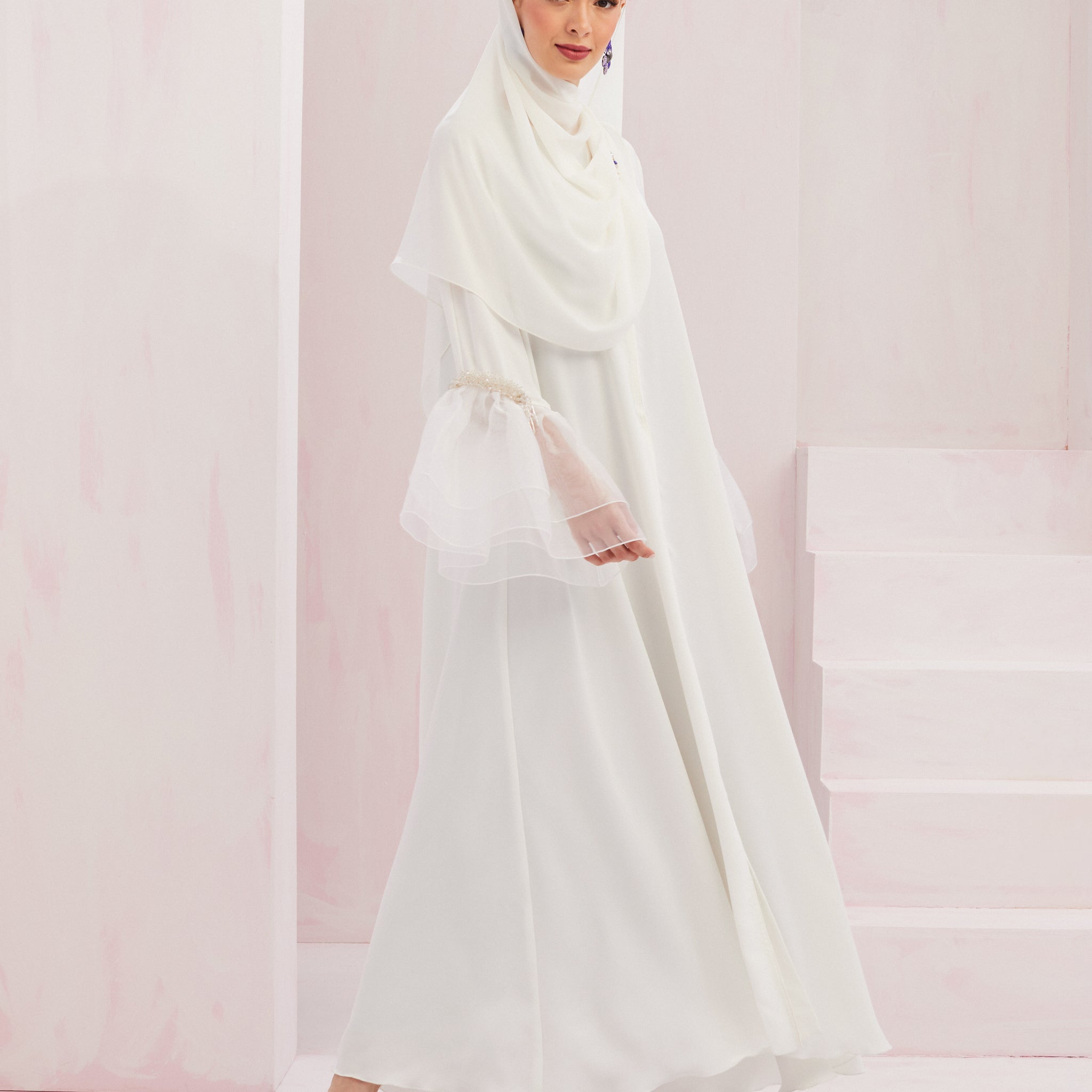 Khloe Abaya in Off White
