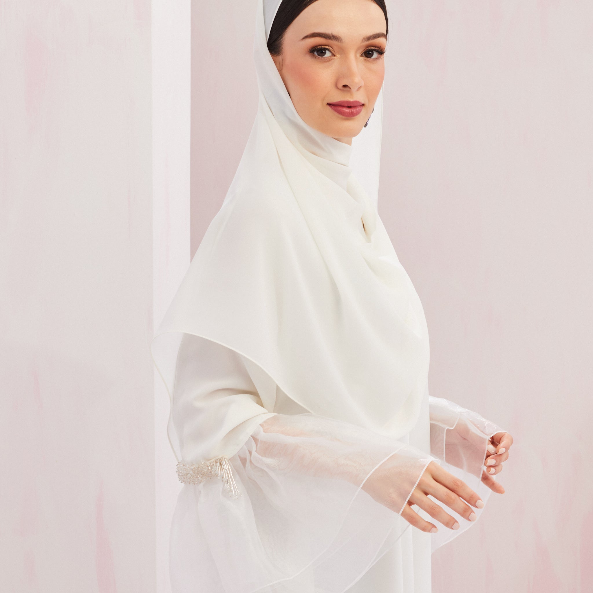 Khloe Abaya in Off White