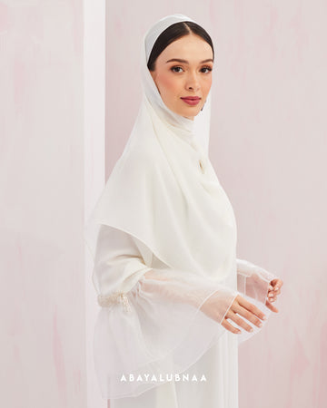 Khloe Abaya in Off White